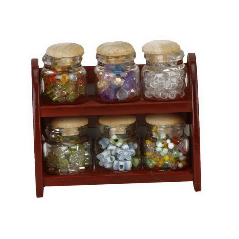 https://dollhouse-haven.myshopify.com/cdn/shop/products/Glass-Spice-Pot-Bottle-Jars-Rack-1-12-Dollhouse-Miniature-Doll-House-Kitchen-Accessory.jpg?v=1571710211